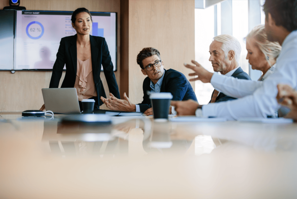 business people in conference room woman presenting compressed